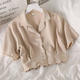 Camisa sexy corta y ajustada con cuello en V